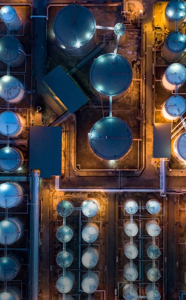 Hington Klarsey: Aerial top view storage tank farm at night