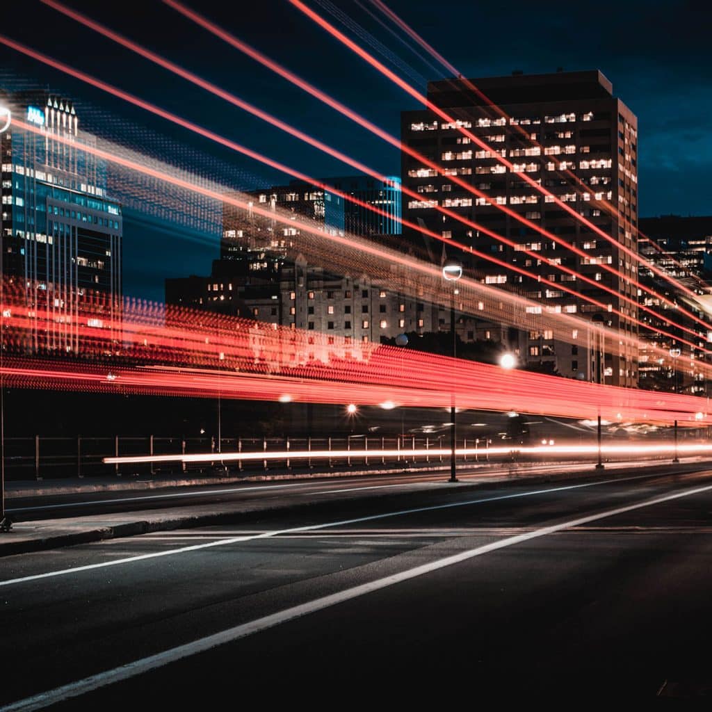 Hington Klarsey: Red Speed Lights from Bus and Cars on a Road To City