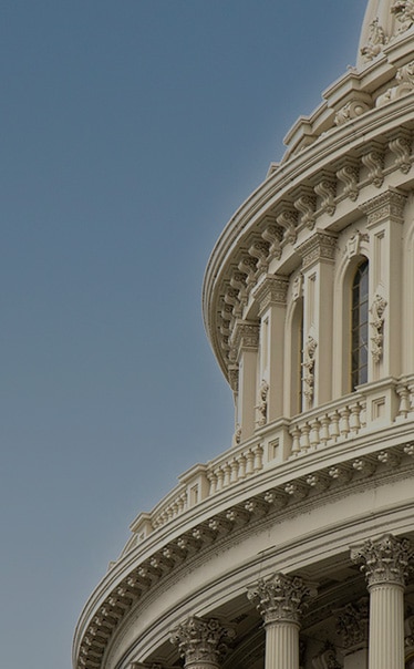 Hington Klarsey: close-up of capitol building with columns